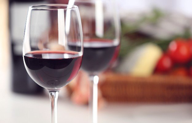 glasses of red wines on the table | Quercetin: The Health Benefits Unravelled