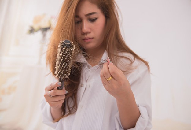 Portrait of asian woman long hair with a comb and …ss-T4 Stimulate Hair Growth and Stop Hair Loss | What Is The Role Of GHK-Cu To Keeping Healthy Skin & Hair?