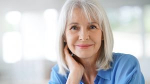 portrait-senior-woman-blue-shirt-ss-What Is TA-65 and Its Role in Aging?-Feature | What Is TA-65 and Its Role in Aging?
