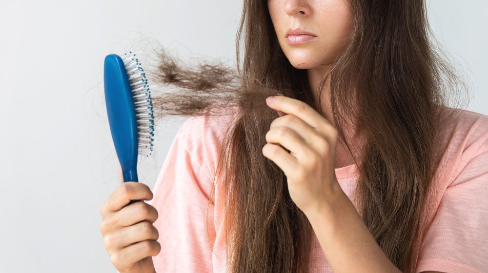 BLOG_PH_women-upset-because-of-hair-loss-----What-Is-Hair-Loss_feature | Which Vitamin Deficiency Causes Hair Loss