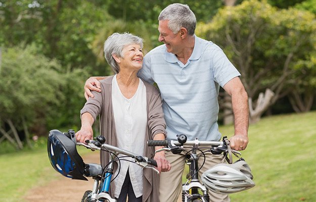 Portrait-of-a-senior-couple-on-cycle-ride-at-the-park-Are-the-Hallmarks-of-Aging-Interconnected