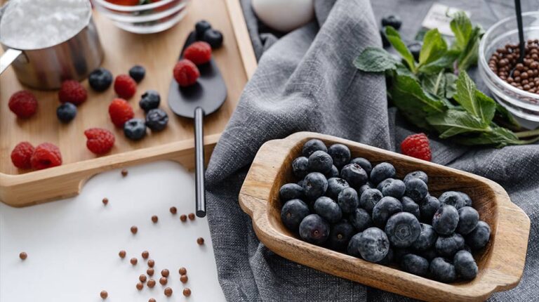 blueberries-on-a-wooden-tray---Jumpstart-Weight-Loss-With-Biohacking,-Nutraceuticals,-and-Plant-based-Supplements---px-feat
